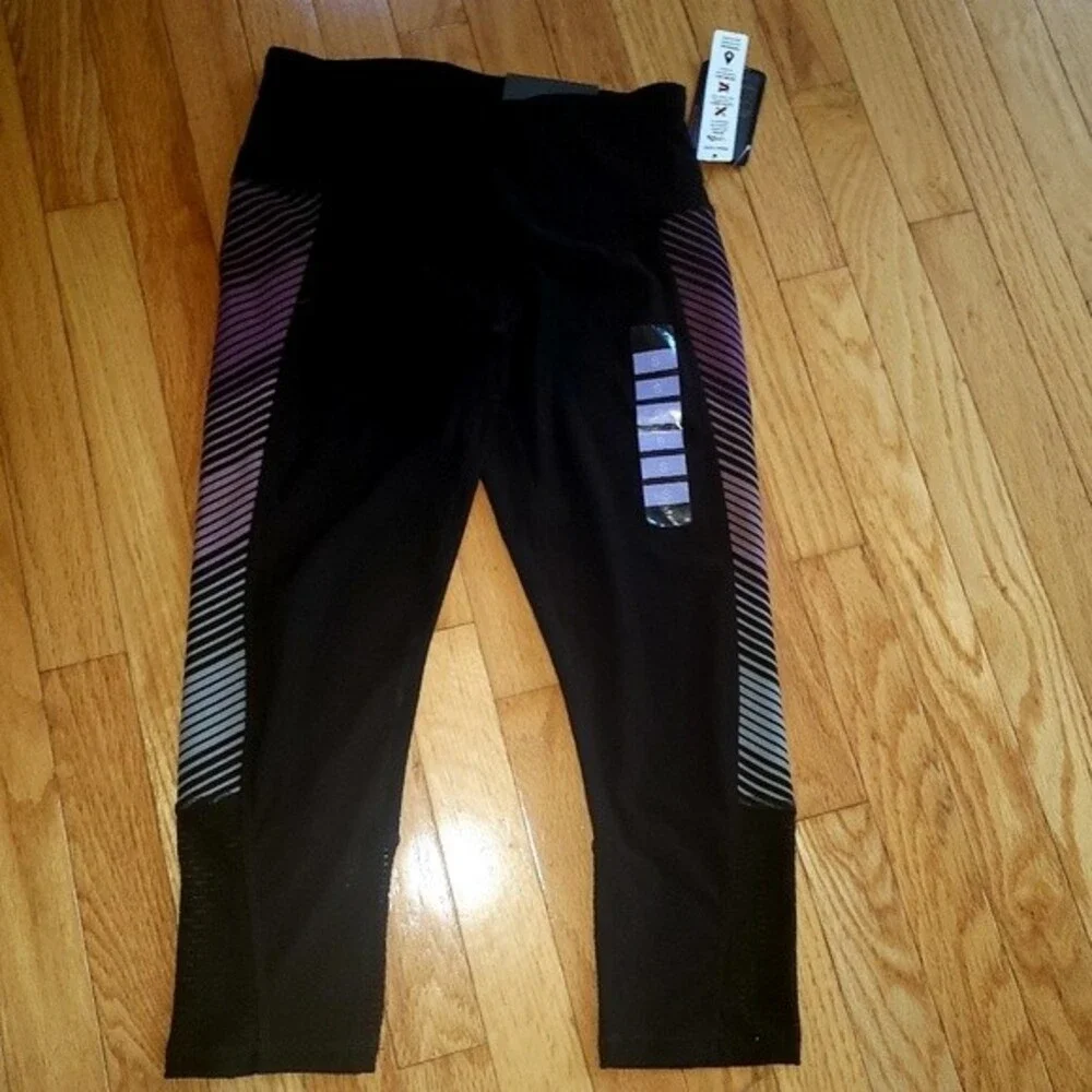 NEW RBX Legging Capri Length Size SMALL Black with Purple Grey accent.